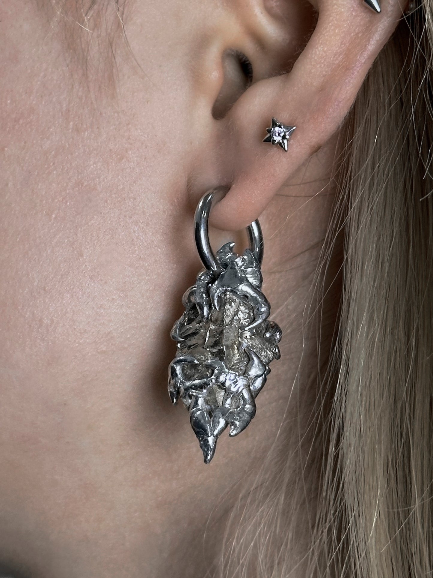 Single earring "Greed"